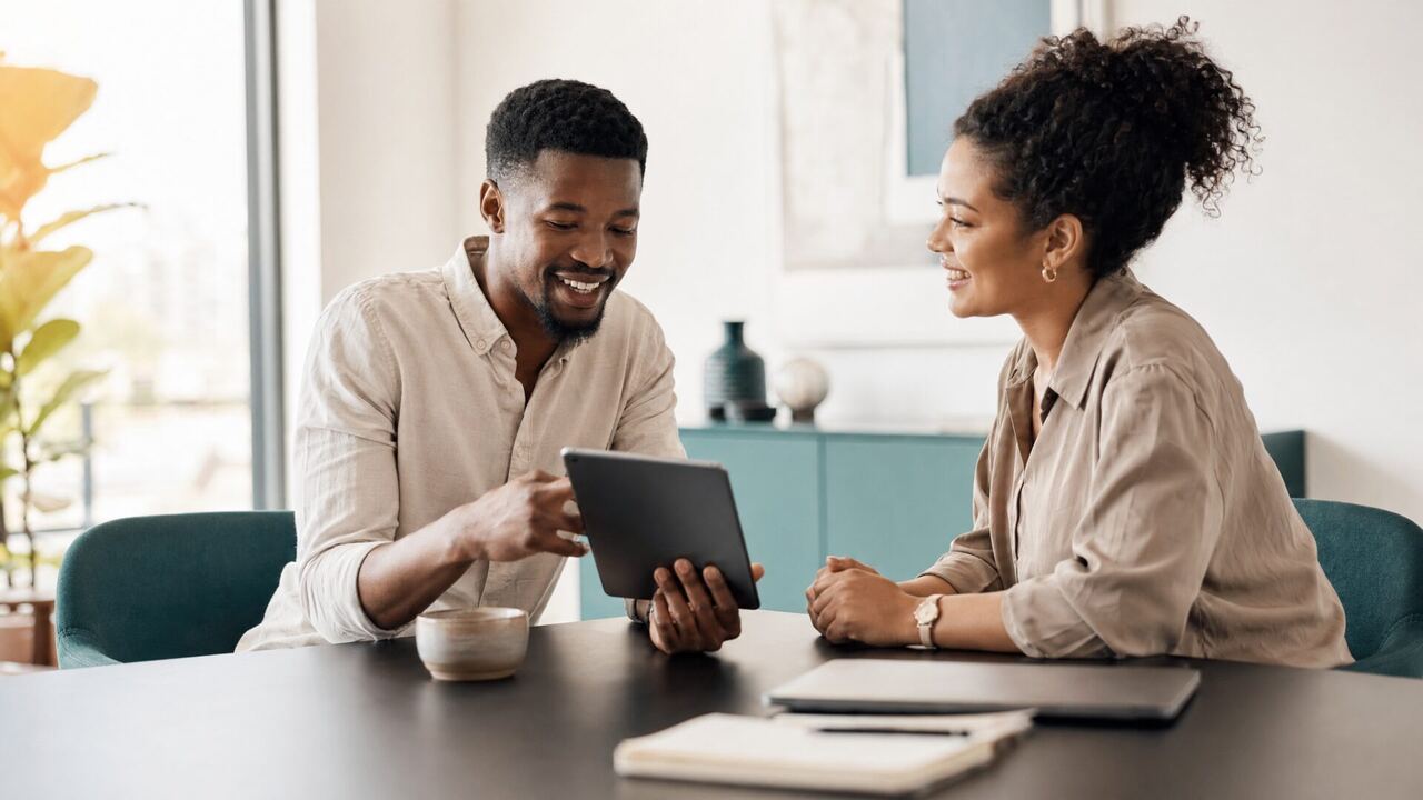 Team collaborating on a tablet
